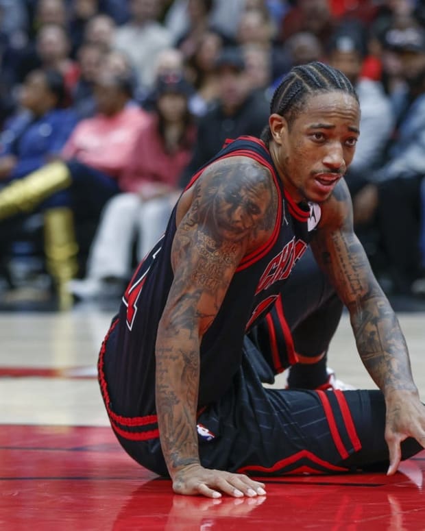 Nov 9, 2022; Chicago, Illinois, USA; Chicago Bulls forward DeMar DeRozan (11) reacts during the second half at United Center. Mandatory Credit: Kamil Krzaczynski-USA TODAY Sports